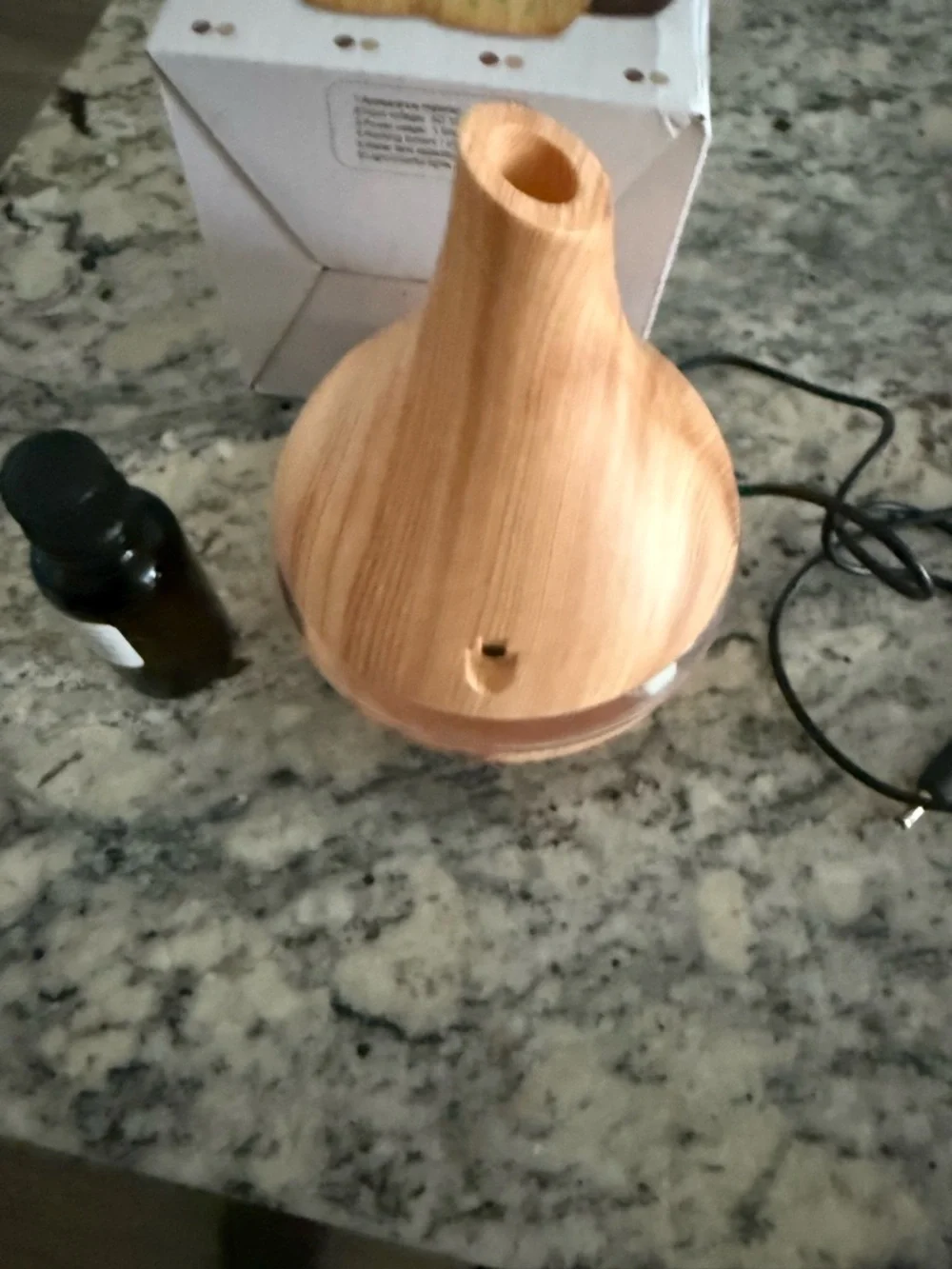 Wood Grain Essential Oil Diffuser - Natural Wood Finish with bottle of oil